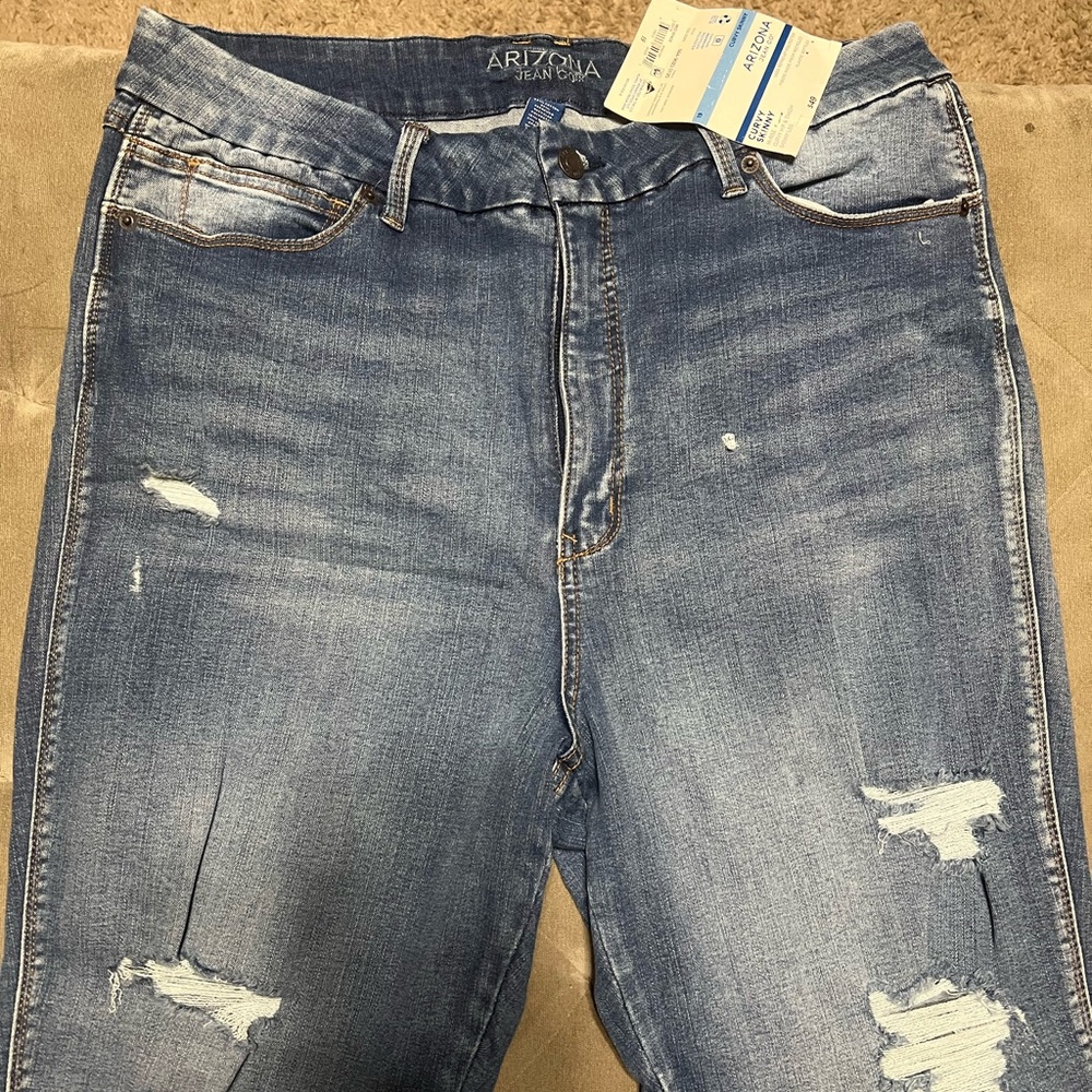 Arizona Jean Company Women’s Light Blue Ripped Skinny Jeans